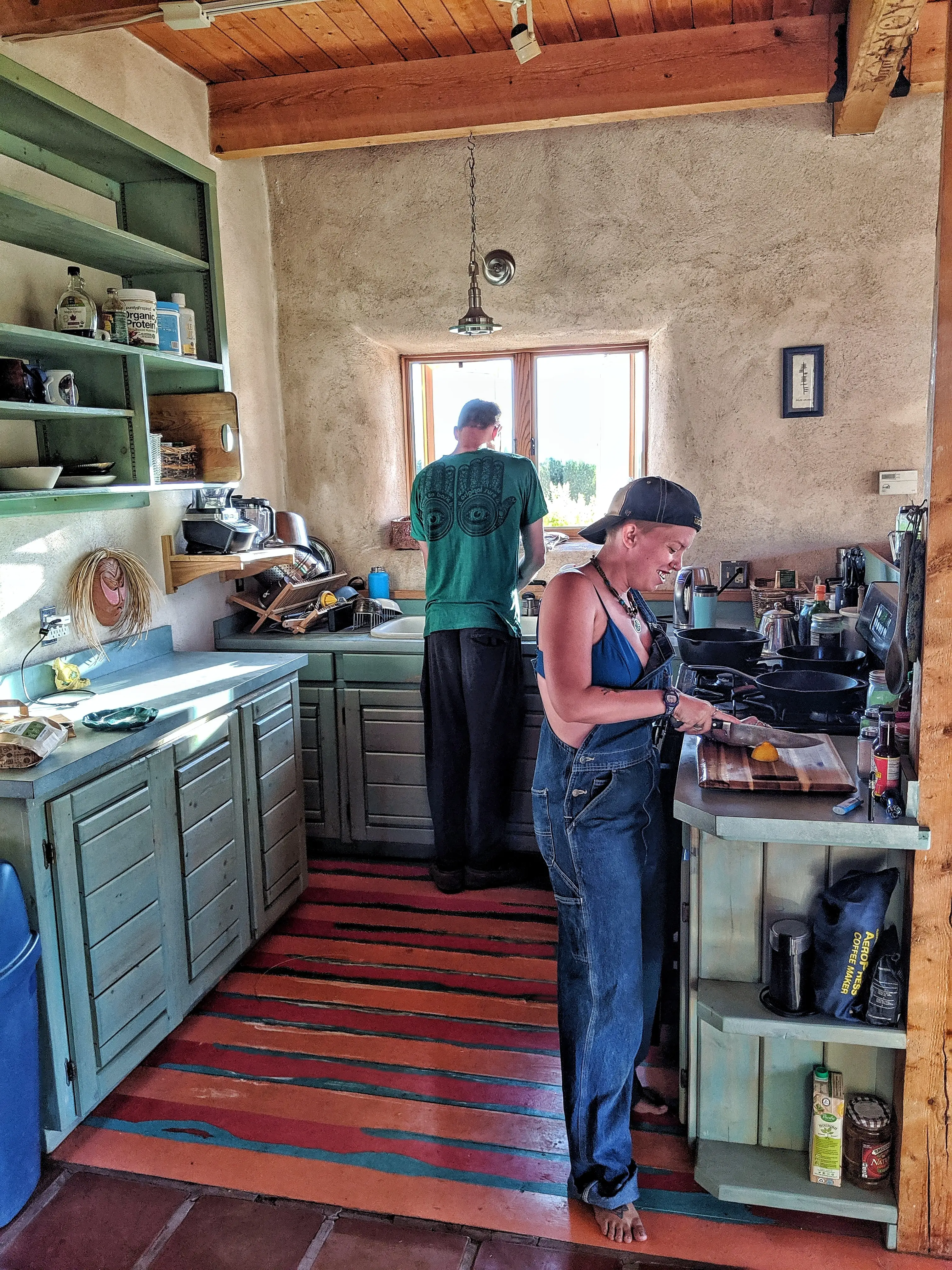 Jayme Serbell nad her husband cooking in their new mexico home