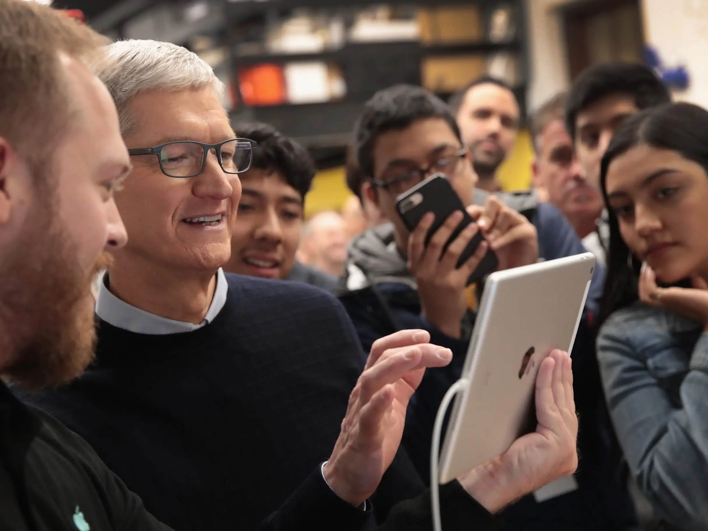 Tim Cook using an iPad.