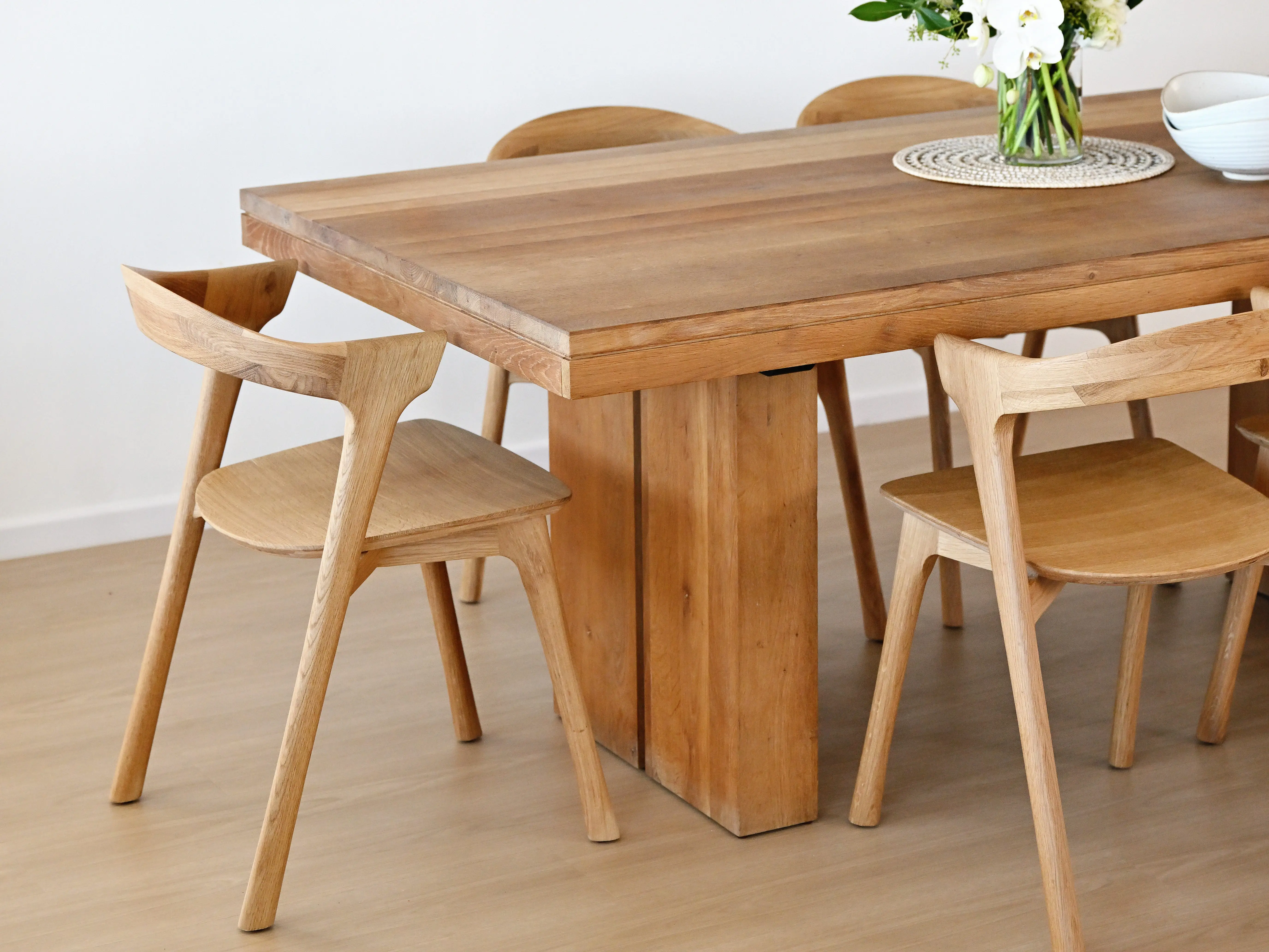 A wooden table and chairs.