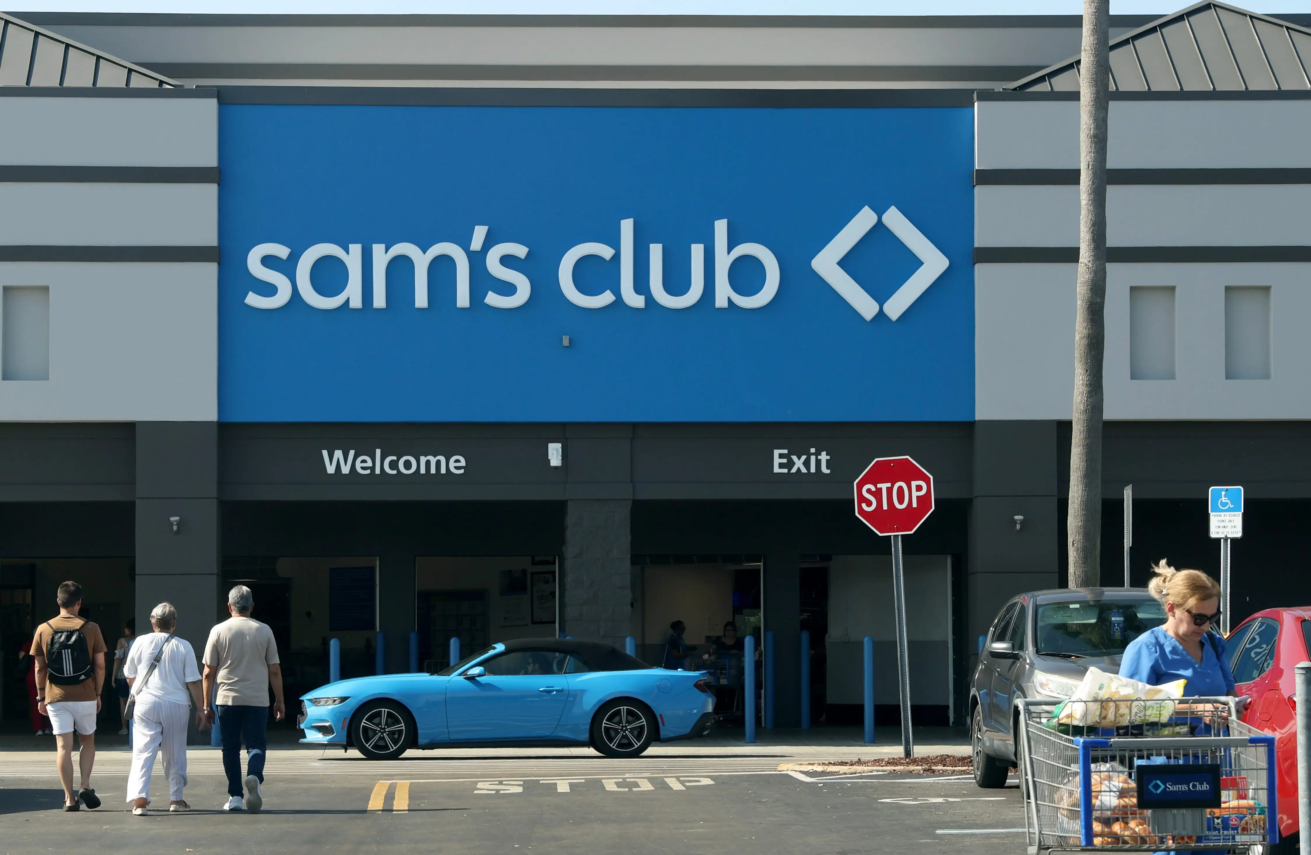 A Sam's Club sign hangs on the wall of a store on July 07, 2025 in Miami, Florida.