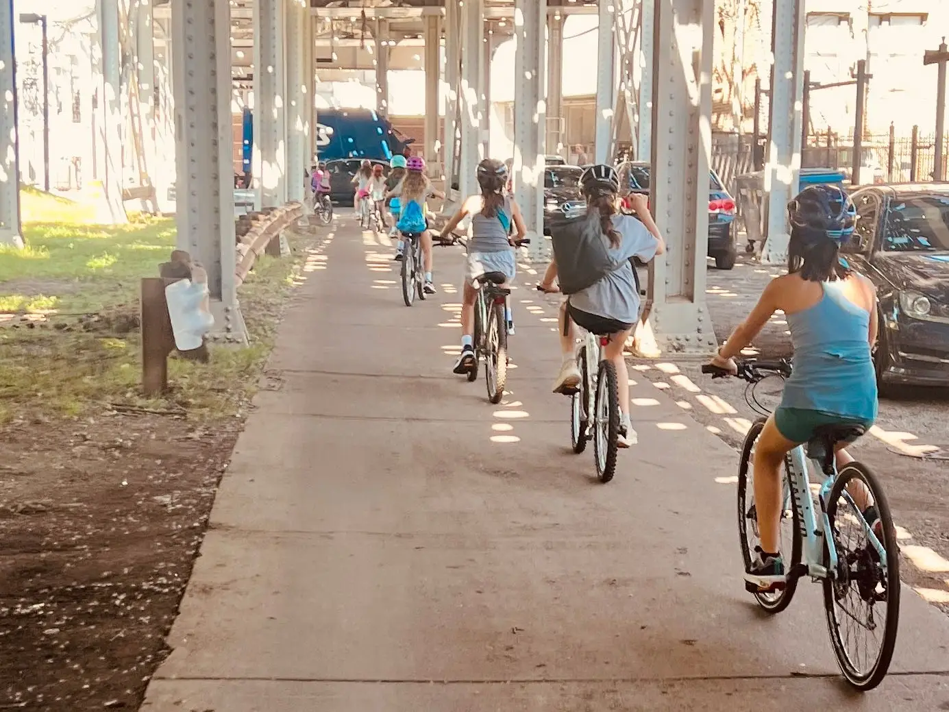 Kids biking in a line