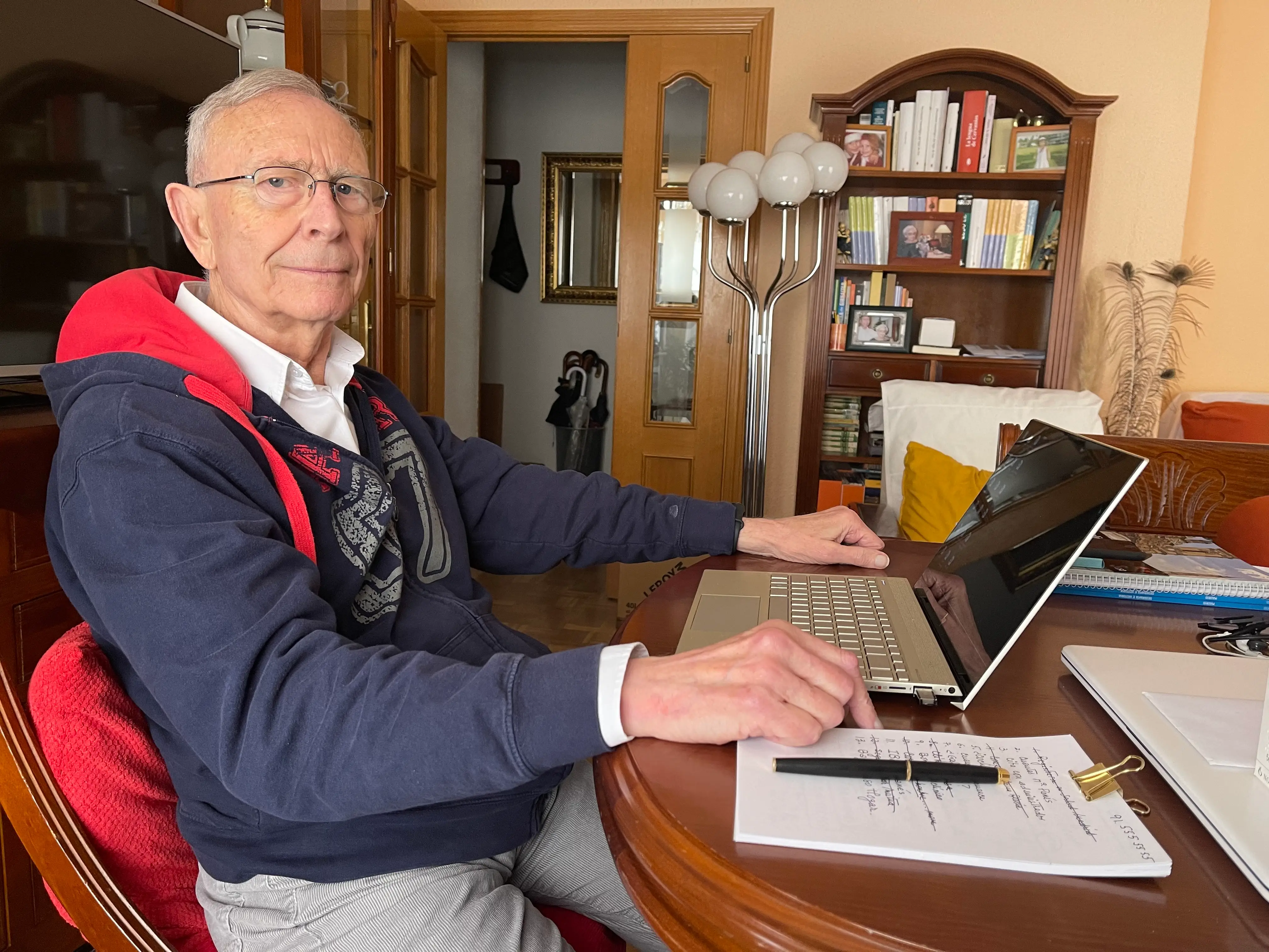 Lorraine C. Ladish's father is sitting at his computer