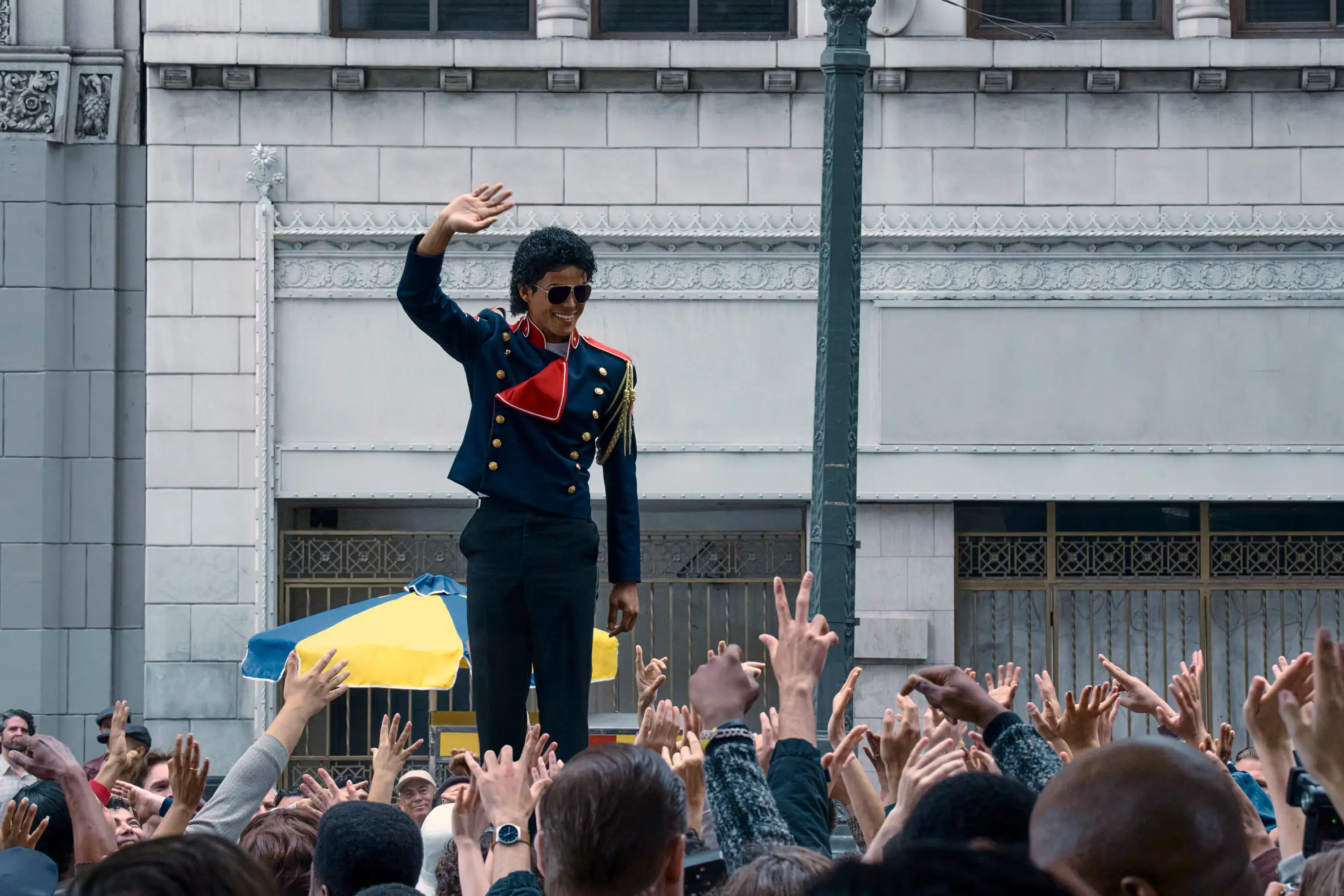 Michael Jackson on top of a car in Michael movie