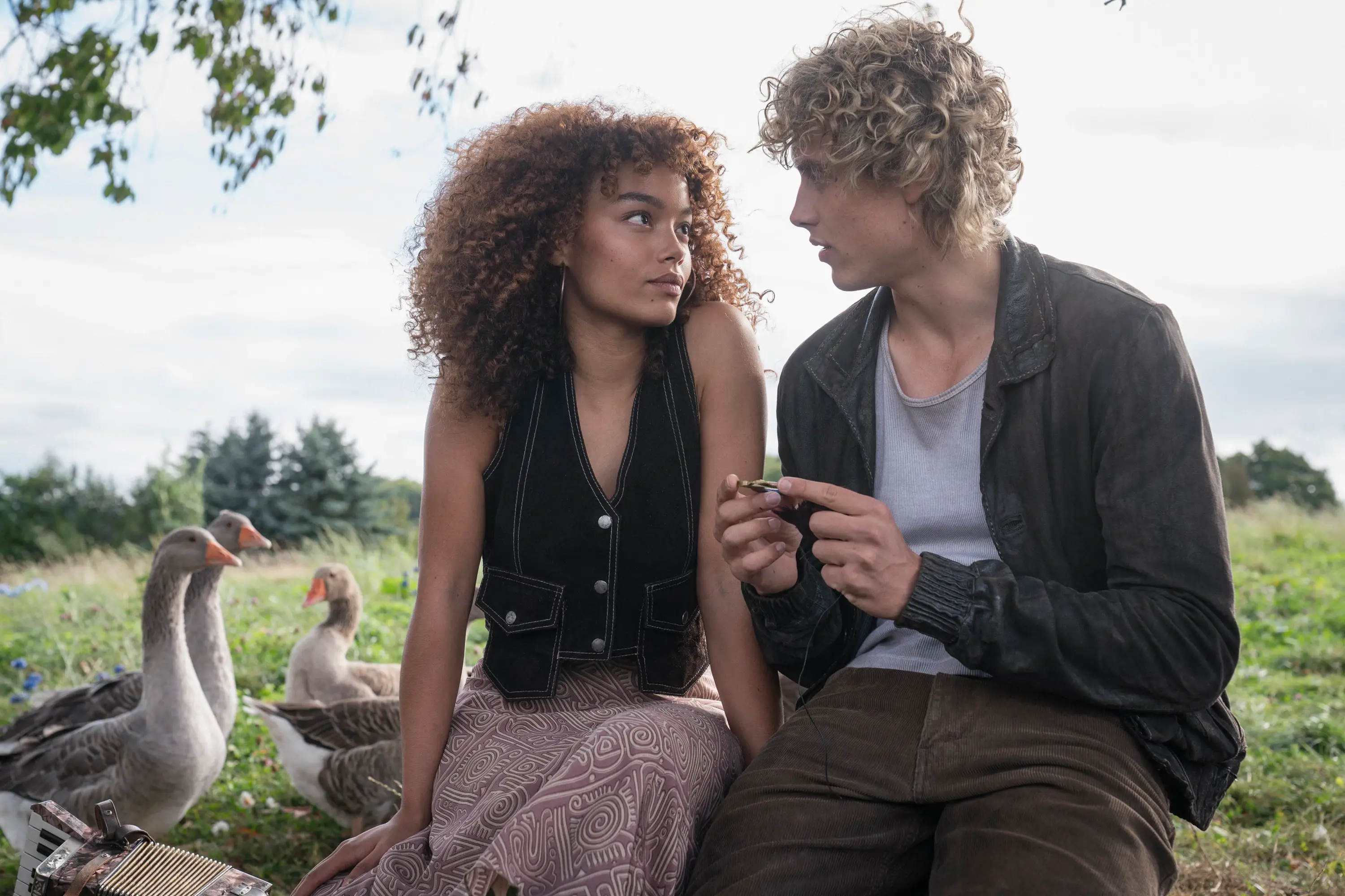 Hunger Games characters sitting down