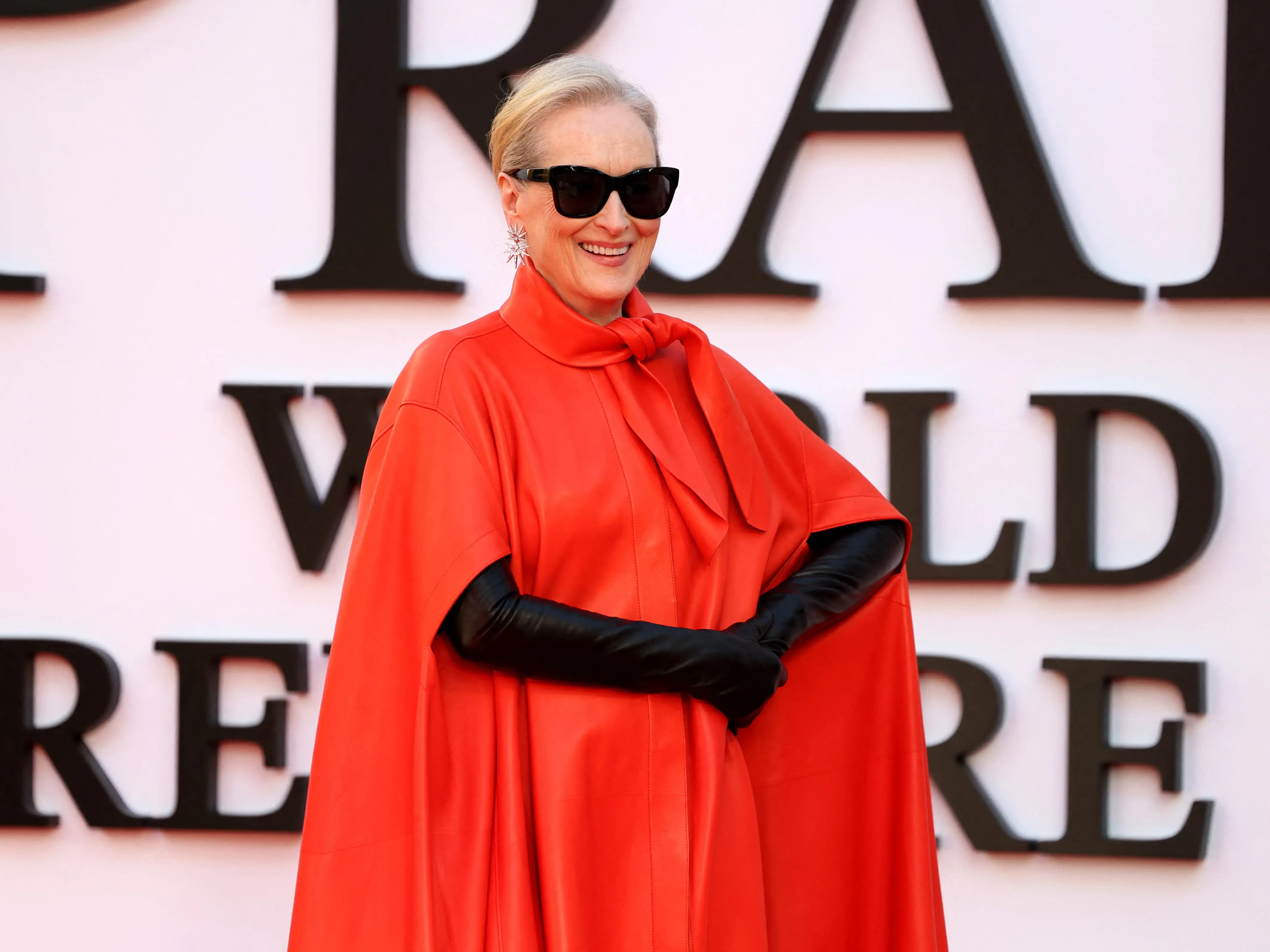 Meryl Streep in sunglasses smiling.