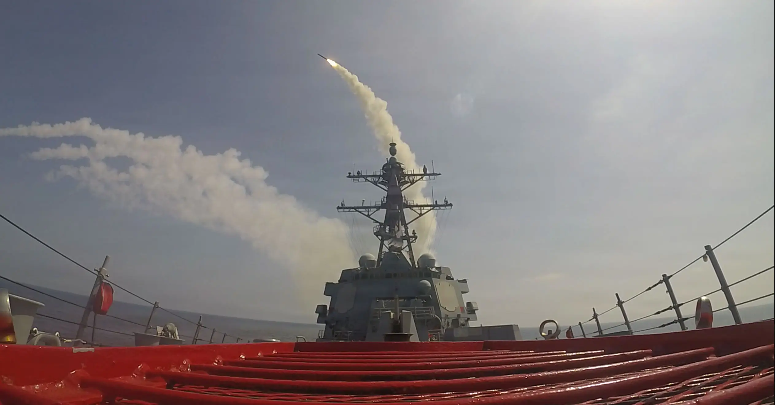 The Arleigh Burke-class guided-missile destroyer USS Frank E. Petersen Jr. fires a Tomahawk Land Attack Missile during operations in support of Operation Epic Fury.