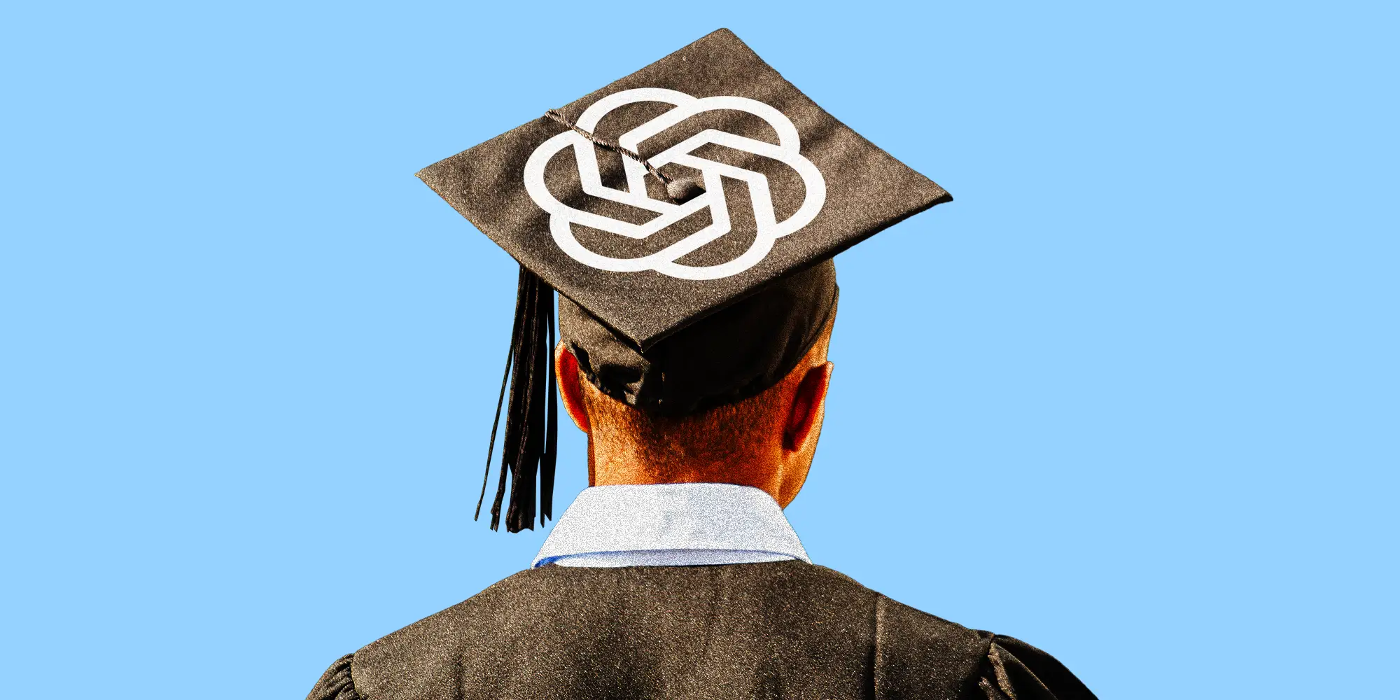 A college grad with a ChatGPT logo on the cap