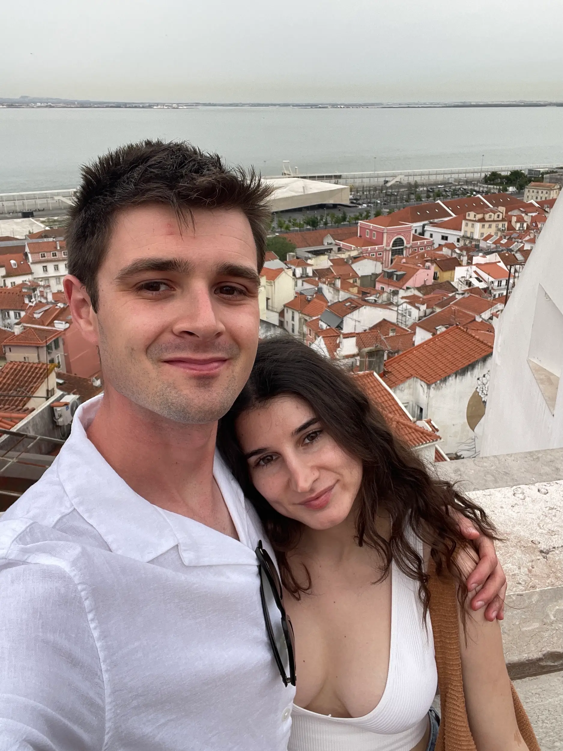 A slefie of a man and woman in Lisbon.