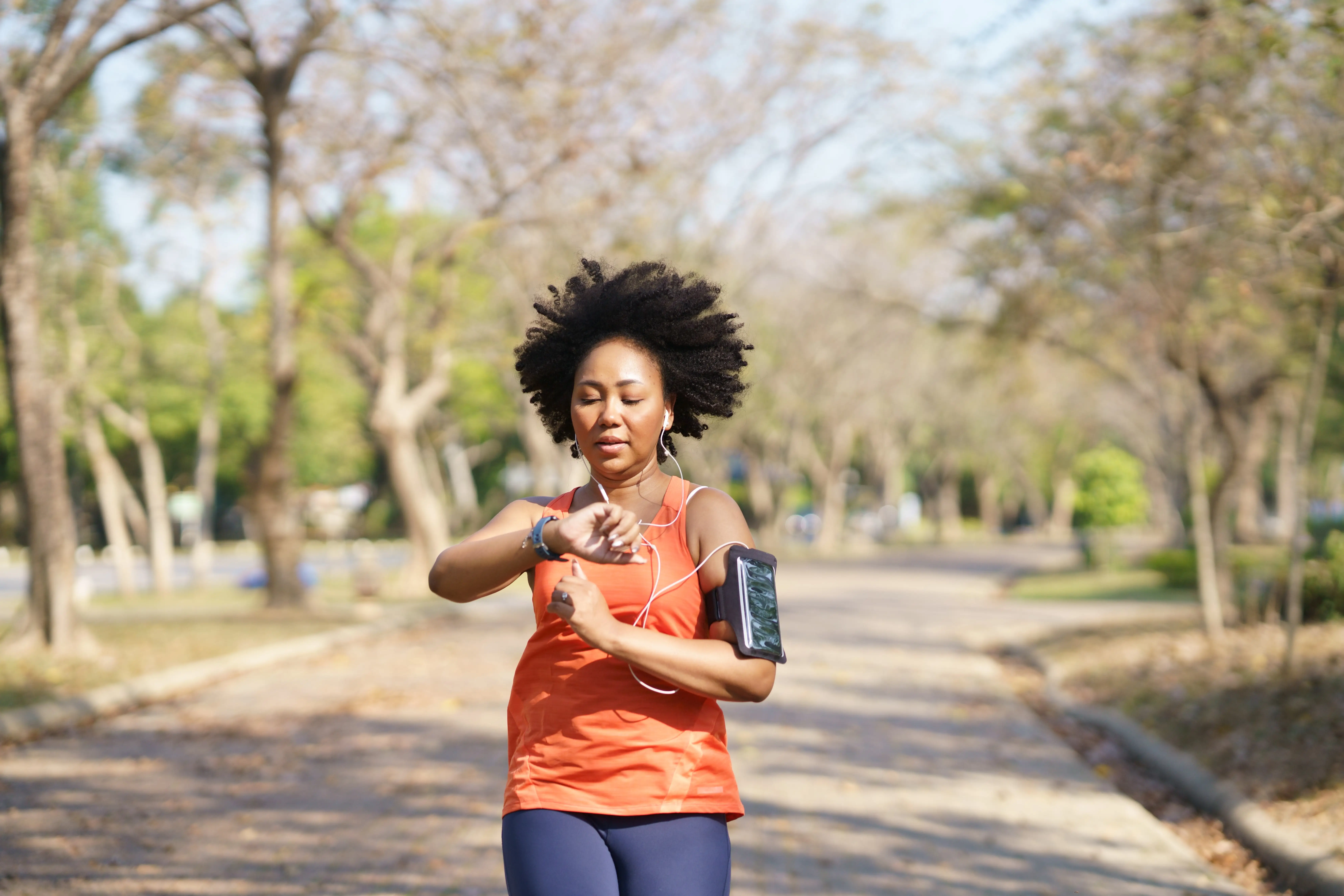 A woman running in the street.