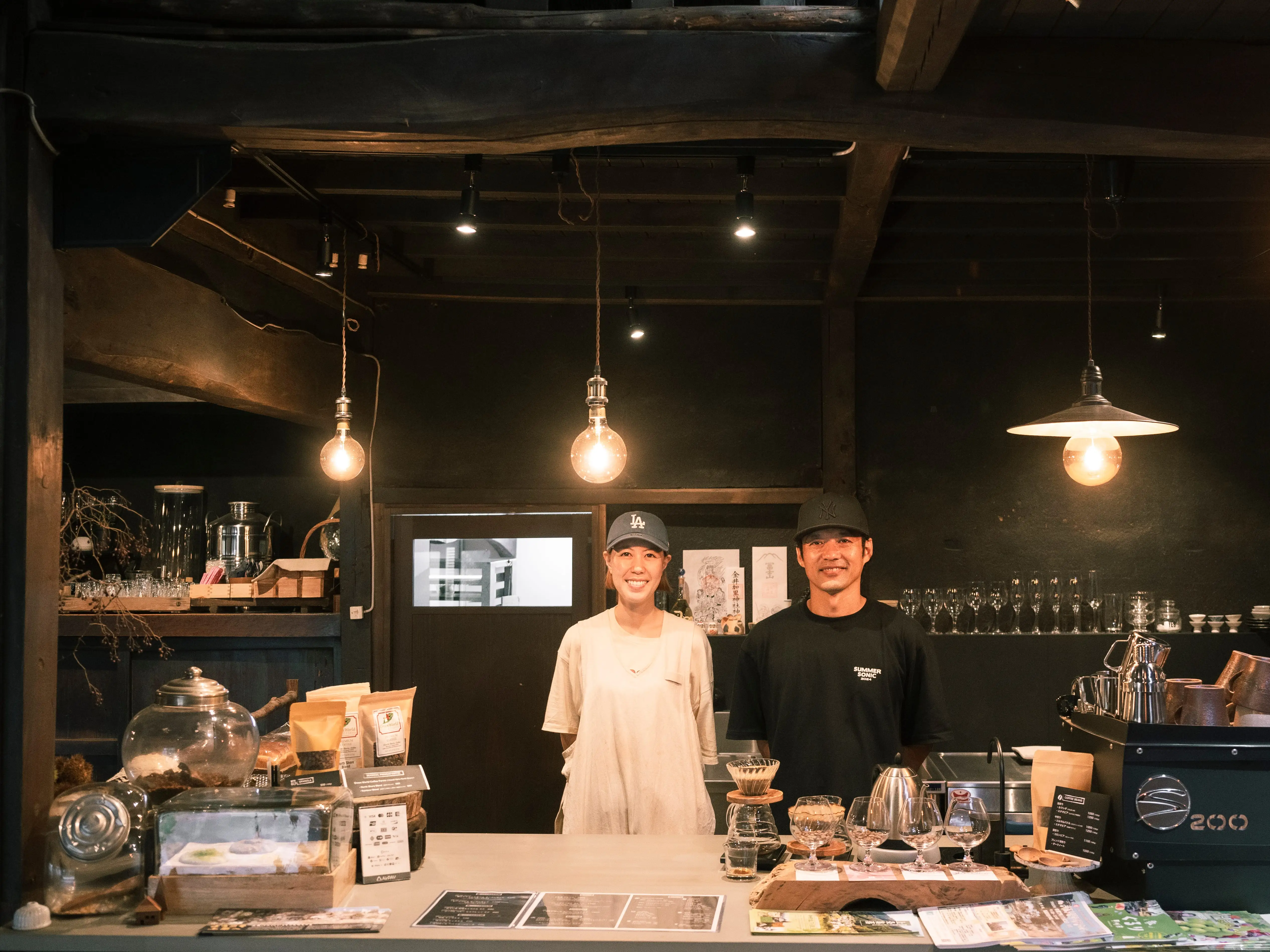 Couple posing at a bakery and cafe in Japan.