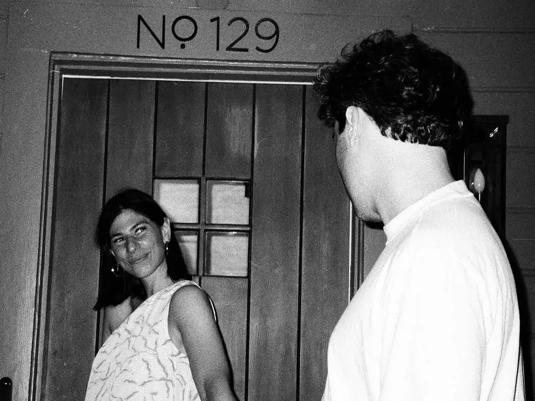 Black and white image of the author and her husband.