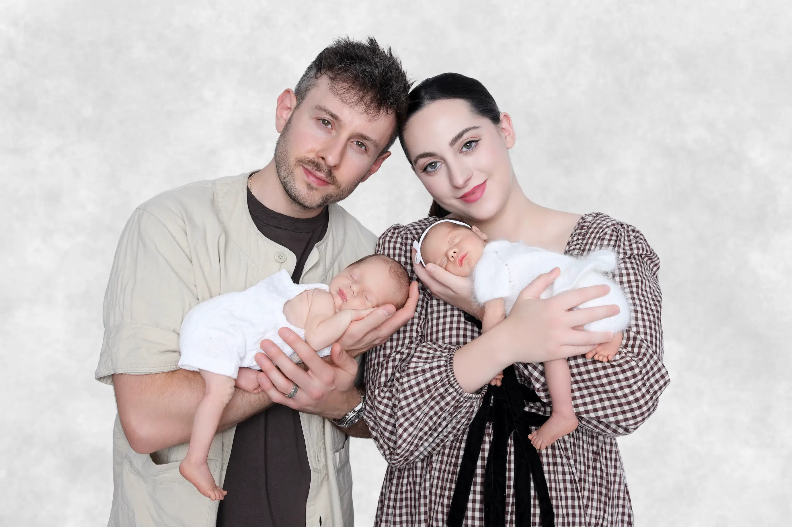 Parents holding twins