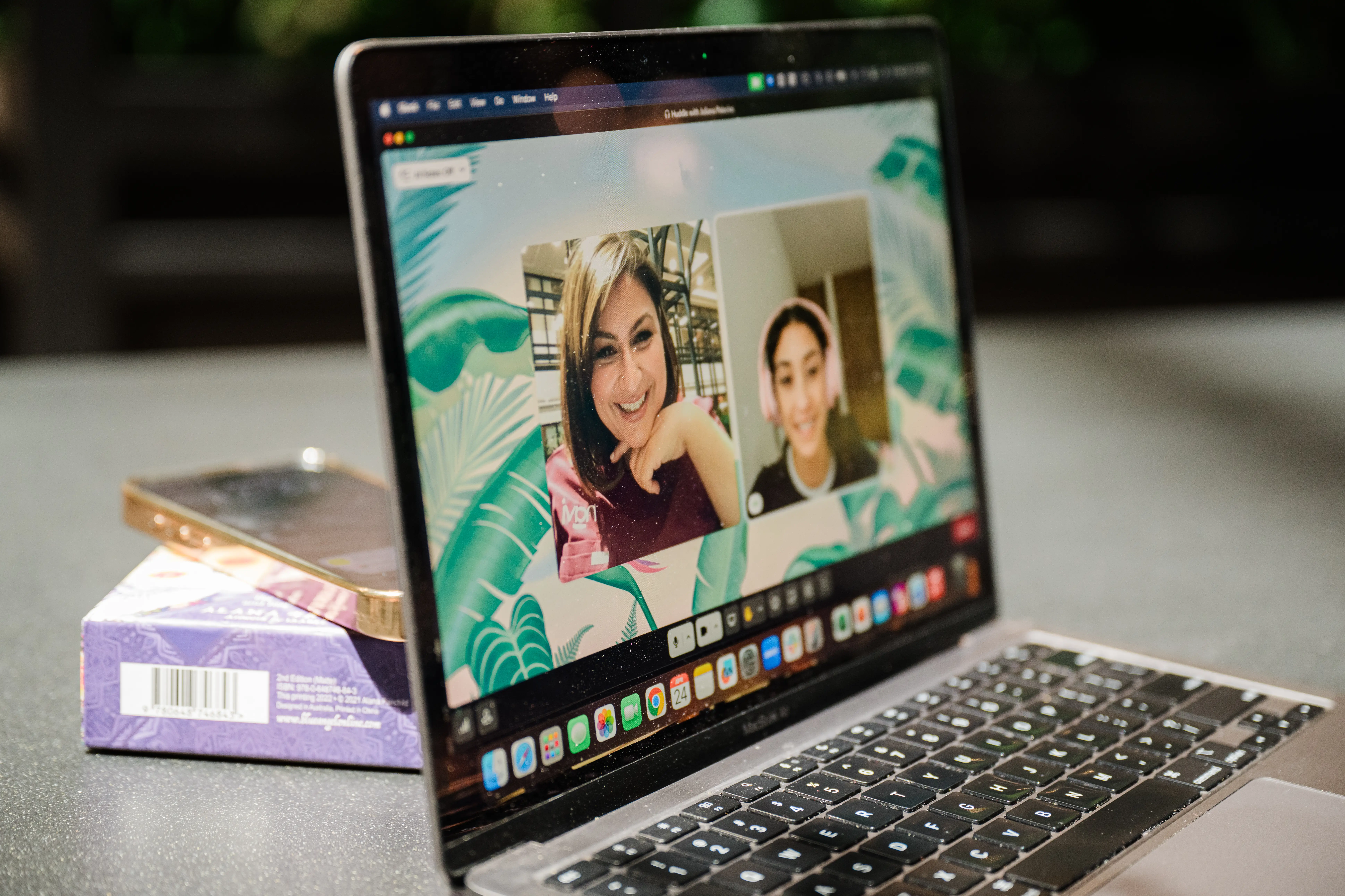 Jasmine Bhatti speaks with her executive assistant, Juliana Palacios via video chat on her laptop.