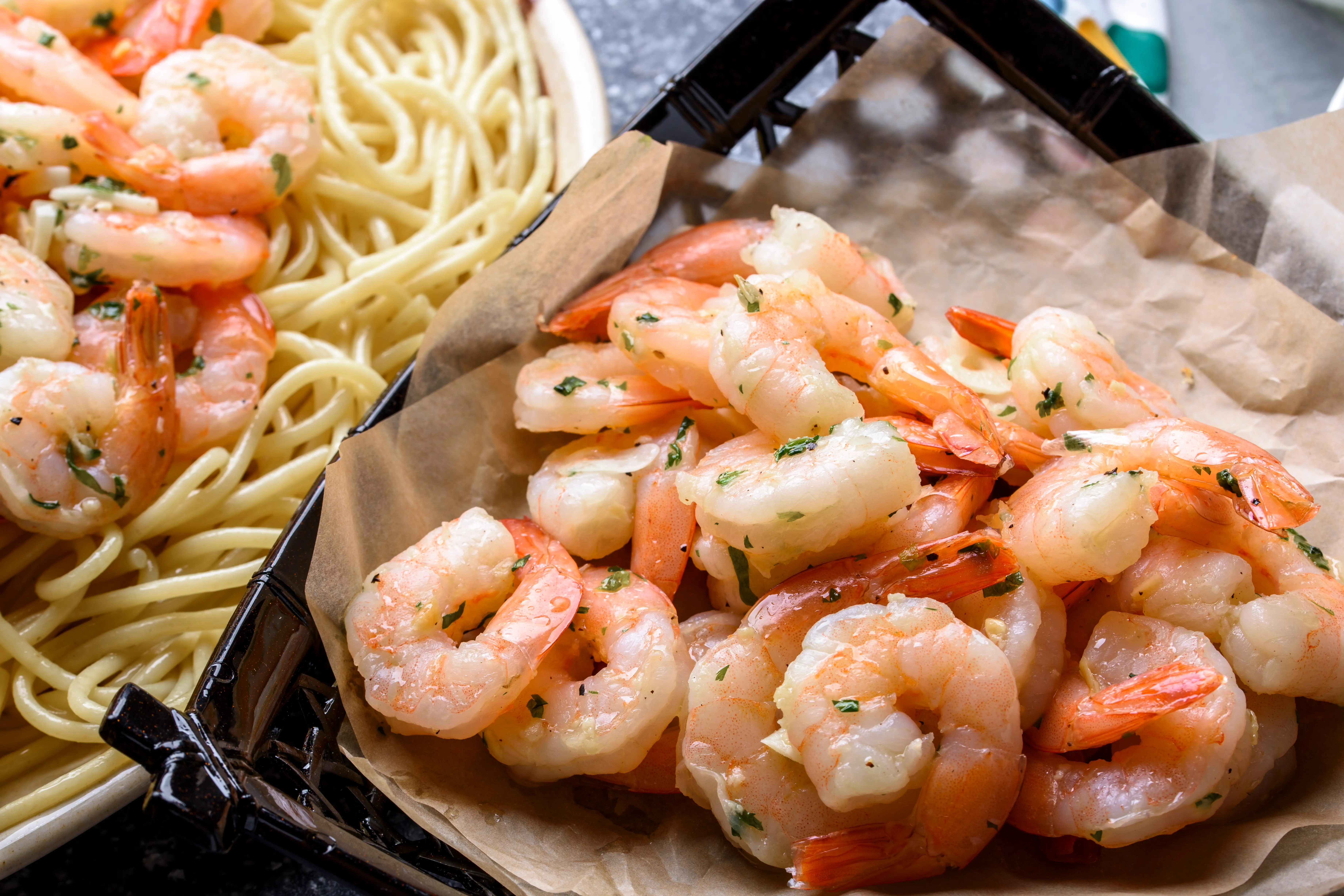 A plate of shrimp alfredo and garlic shrimp
