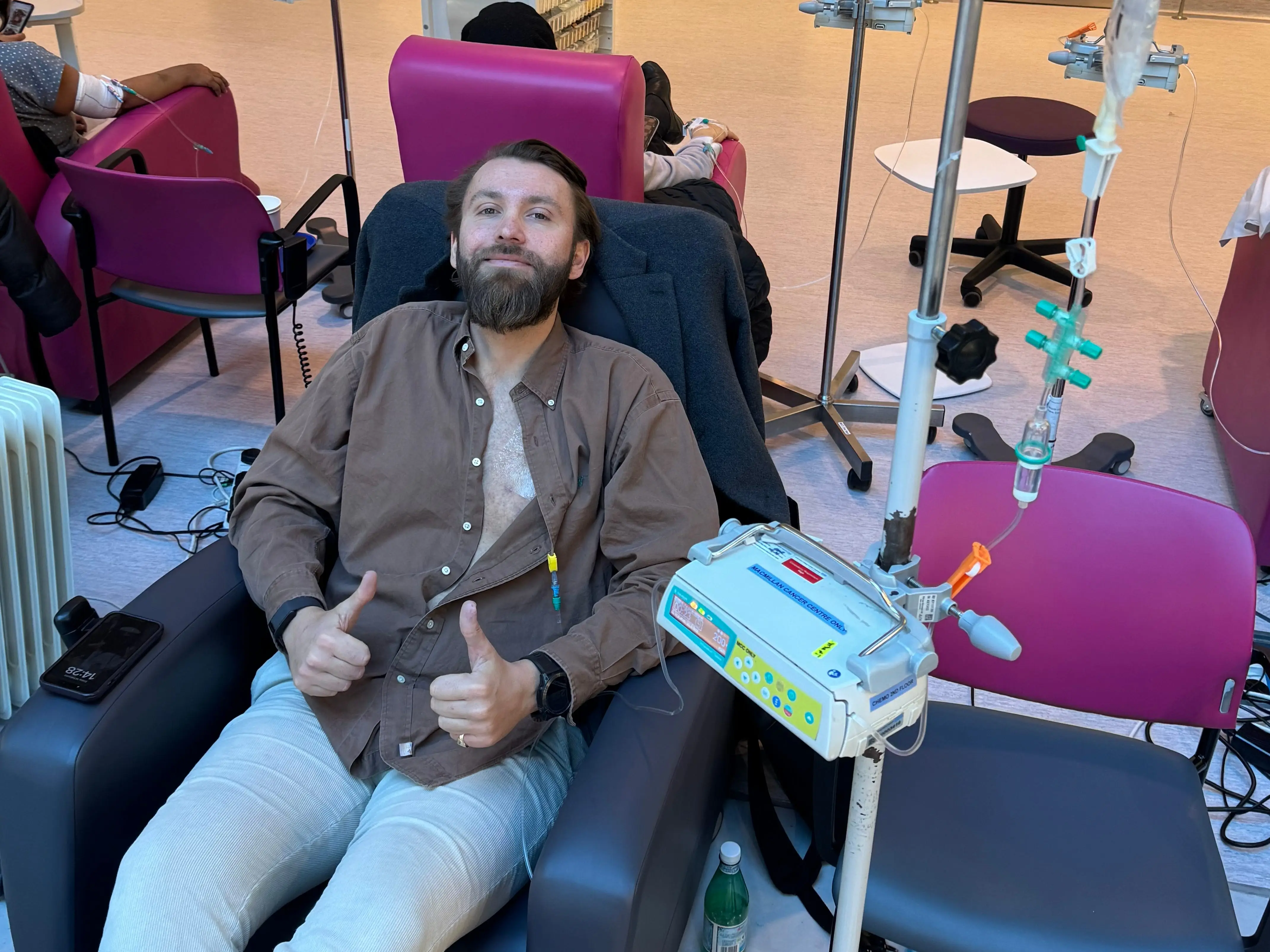 A young man receiving chemotherapy treatment.