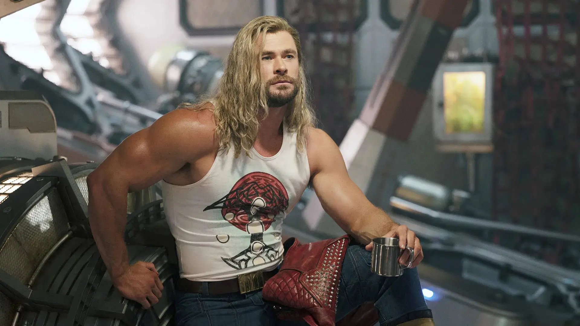 Chris Hemsworth in a white top in Thor Love and Thunder