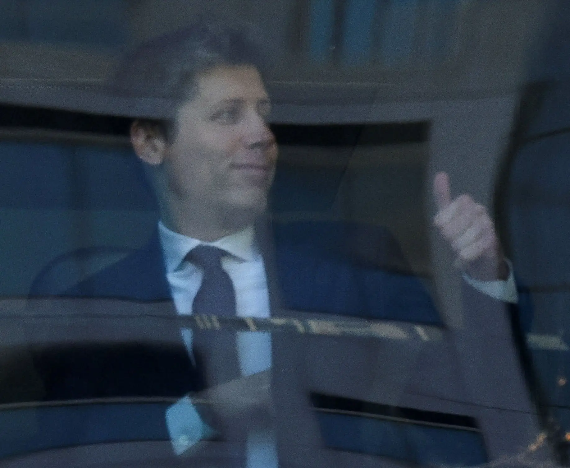 Sam Altman gives a thumb's up