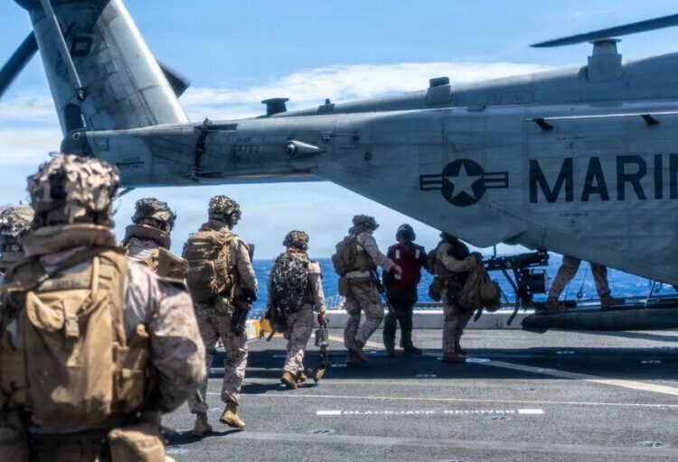 The U.S. is ready to seize Iran-linked ships with boarding parties, report says, while Marines practice maritime raids