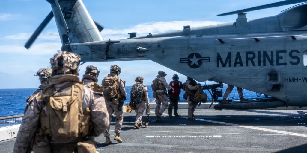 The U.S. is ready to seize Iran-linked ships with boarding parties, report says, while Marines practice maritime raids