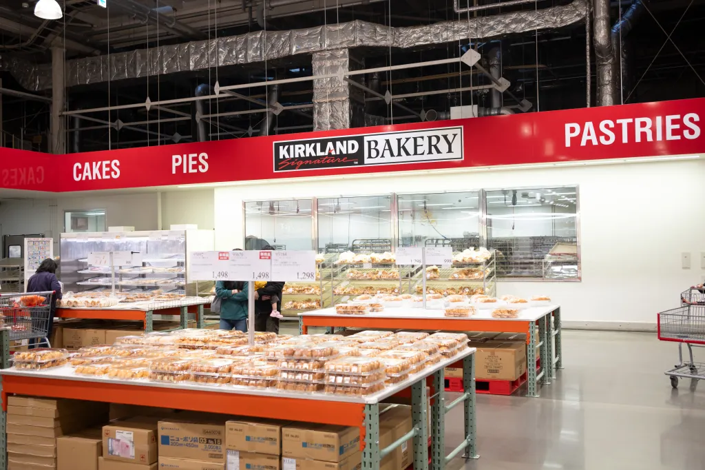 Costco Kirkland Bakery selling cakes, pies, bread, and pastries.