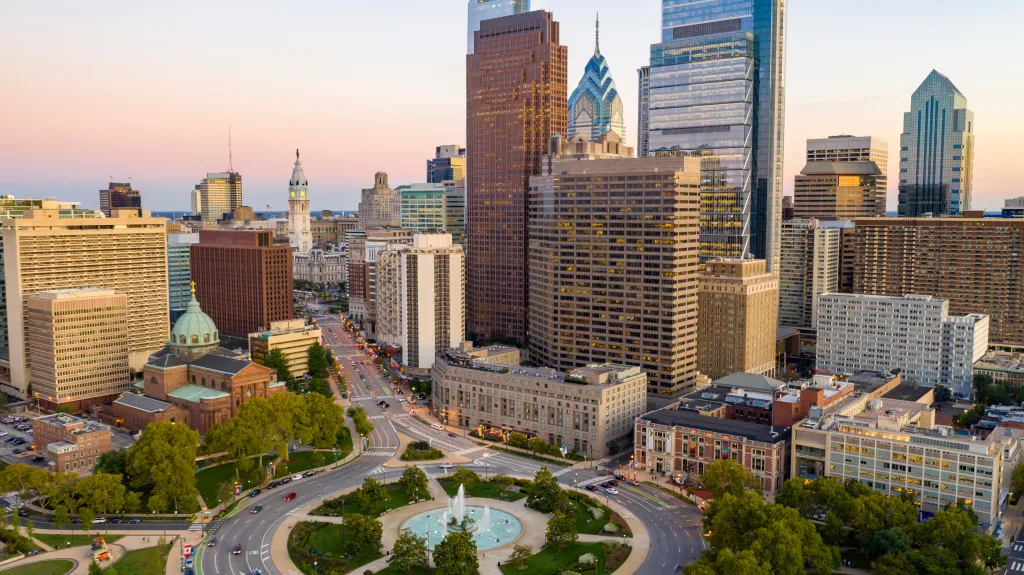 Dusk aerial view of downtown Philadelphia, Pennsylvania, with Logan Square in the foreground.
