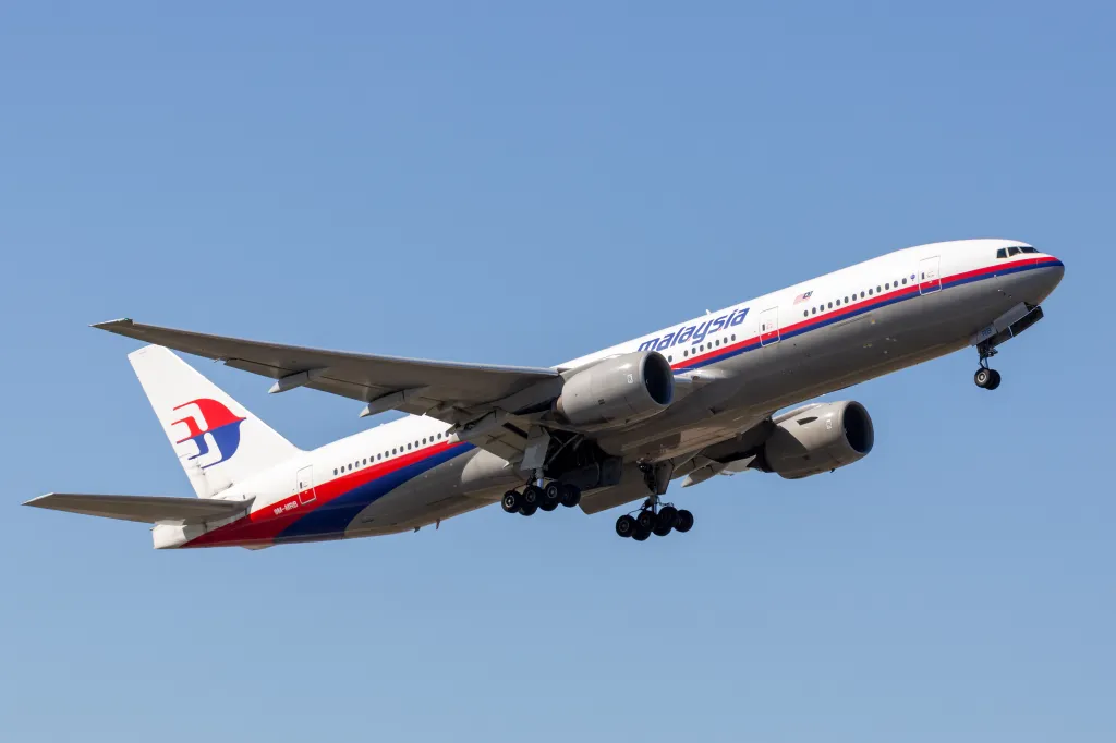 Malaysia Airlines Boeing 777-200ER airliner 9M-MRB departing Melbourne International Airport.