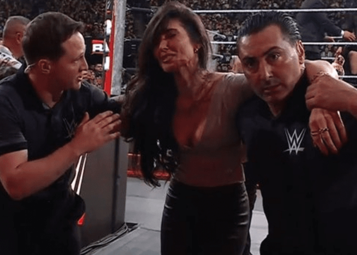 WATCH: Beloved WWE Personality Injured in Wild Brawl on Raw