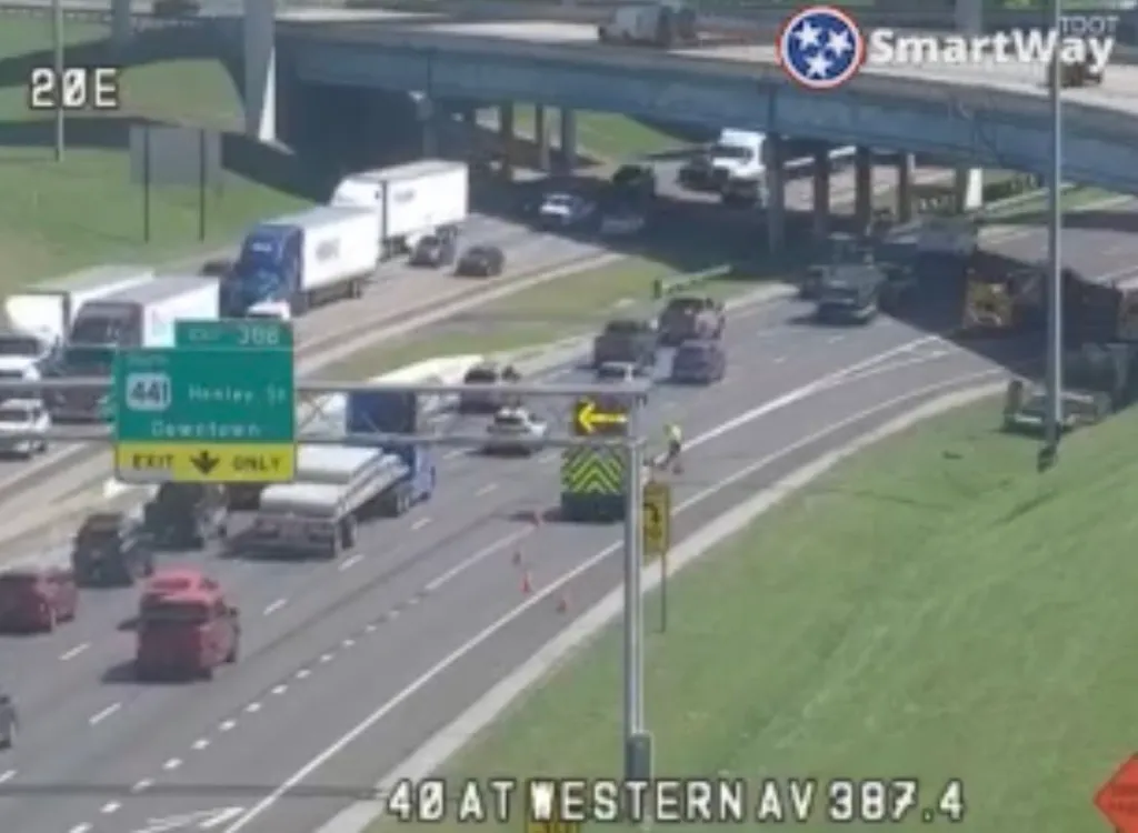 The ramp from I-40 East to Henley Street reopened as officials dealt with the loose bees.