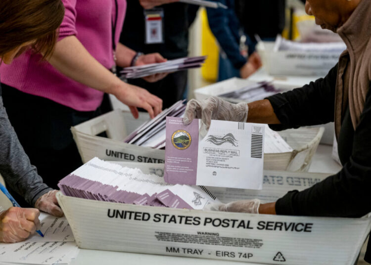 Democrats, voter rights groups file lawsuits on Trump order on mail ballots