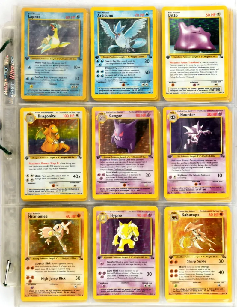 Nine vintage Pokémon cards displayed in a protective sleeve.