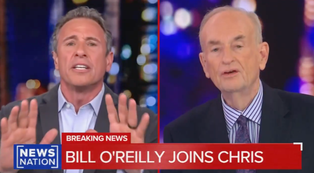 Chris Cuomo holds up his hands to stop Bill O'Reilly from talking during the show on April 8, 2026.