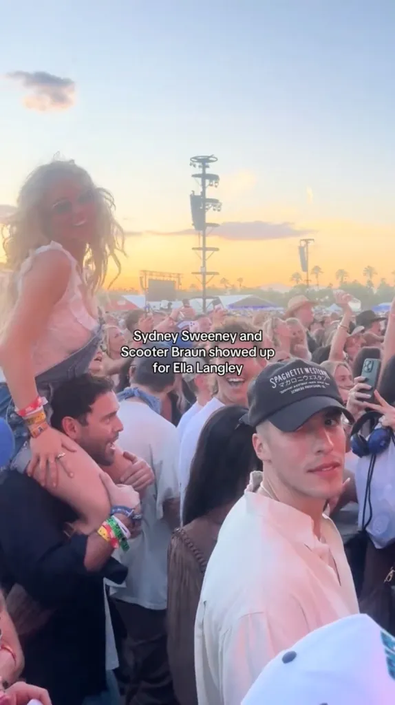 Sydney Sweeney on someone's shoulders and Scooter Braun in a crowd at a concert.