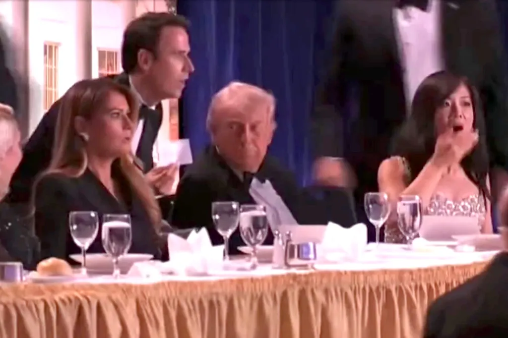First lady Melania Trump and President Donald Trump react to reports of shots fired at the annual White House Correspondents Dinner at the Washington Hilton, Saturday, March 25, 2026, in Washington.