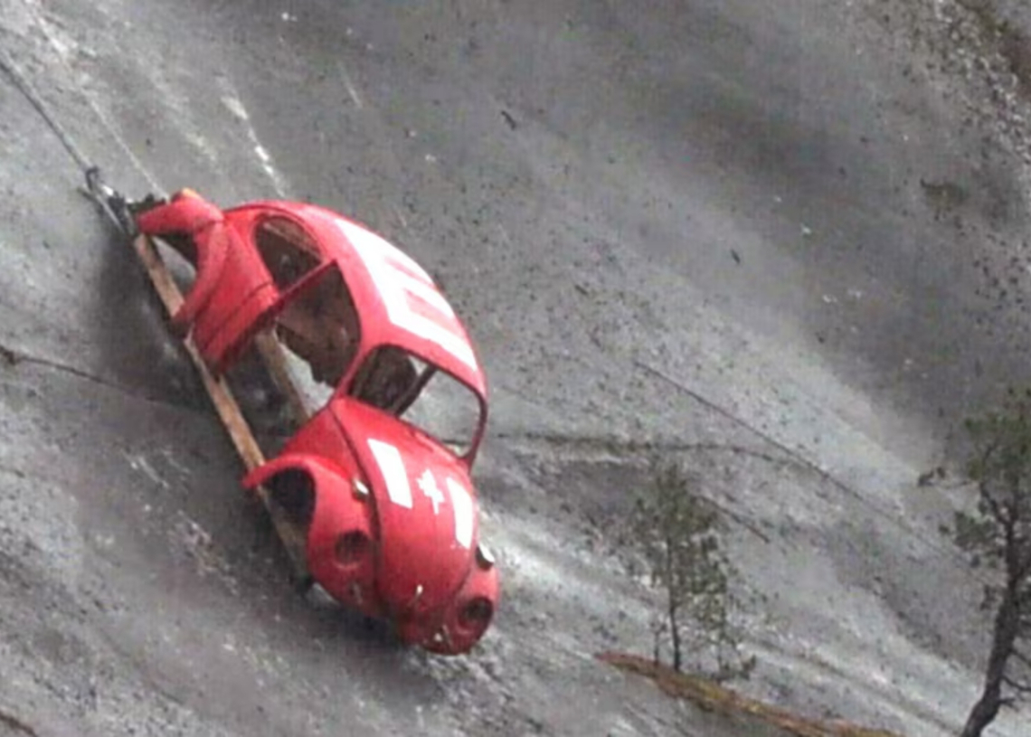 Why Is There a Volkswagen Beetle Hanging Off the Side of a Mountain?
