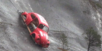 Why Is There a Volkswagen Beetle Hanging Off the Side of a Mountain?