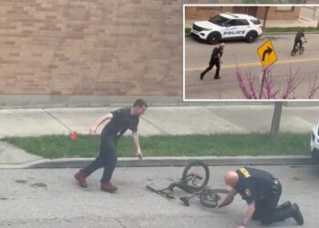 Winded cop struggles to chase down bike-riding rebel in viral ‘cat-and-mouse’ scuffle