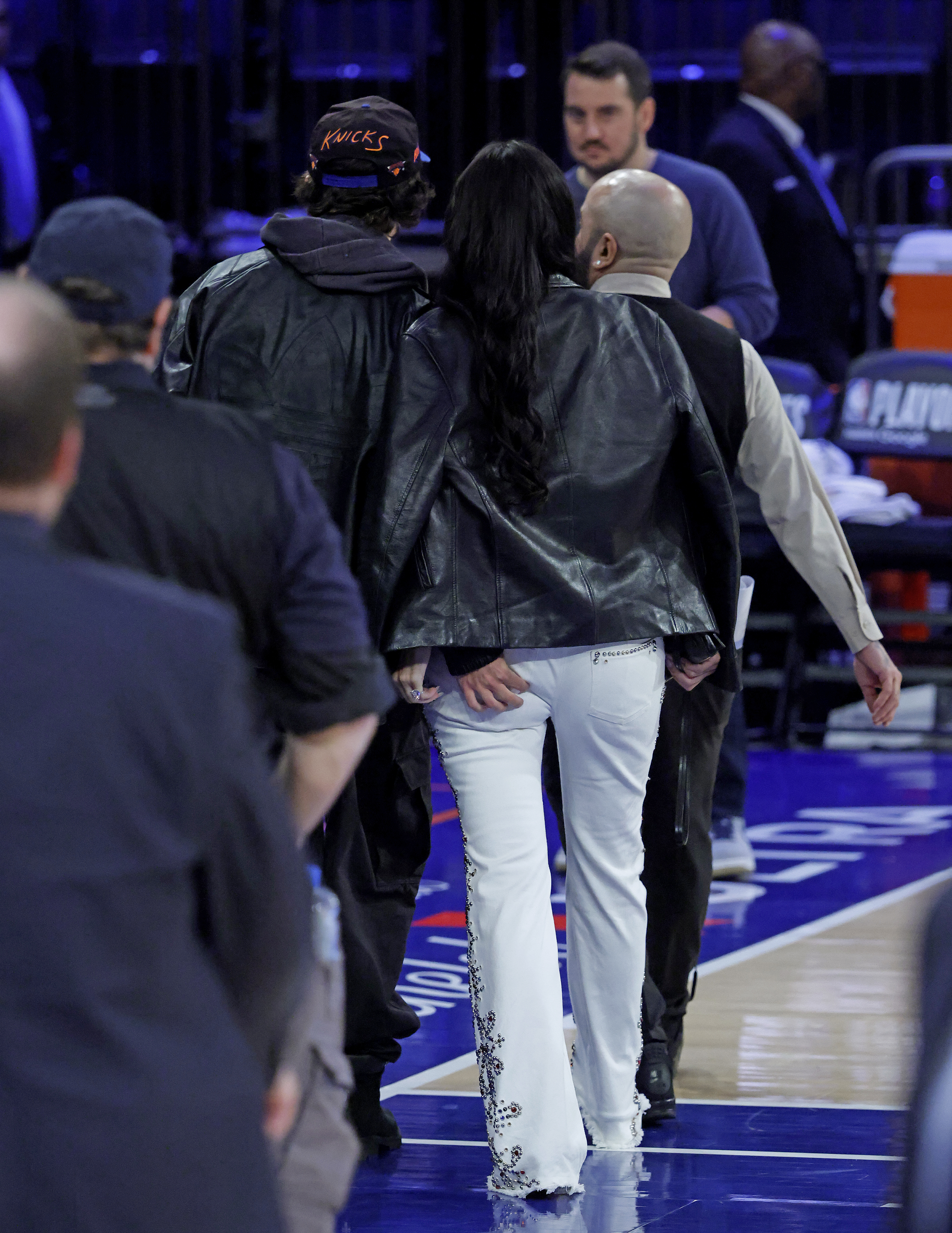 Timothee Chalamet with his hand on Kylie Jenner's rear at an NBA game.