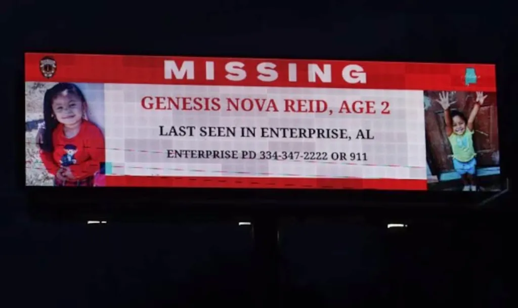 Missing person billboard for 2-year-old Genesis Nova Reid, last seen in Enterprise, AL.
