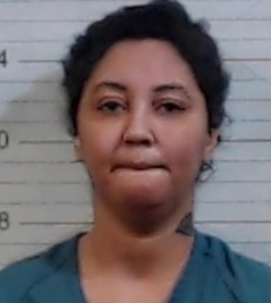 Mugshot of Adrienne Reid.