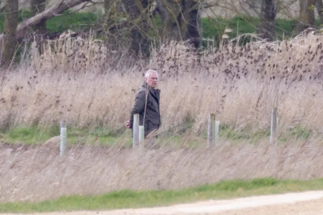 Andrew Mountbatten Windsor walking in Sandringham.
