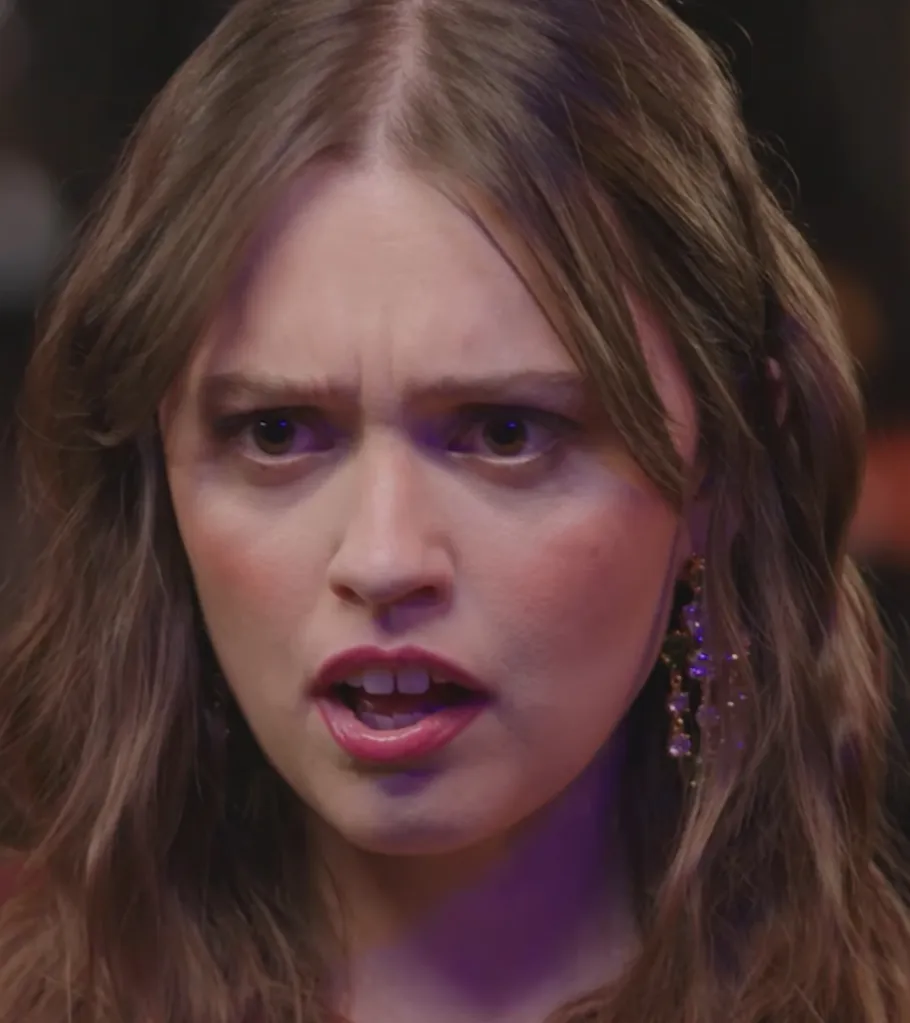 Aimee Lou Wood with a questioning expression.