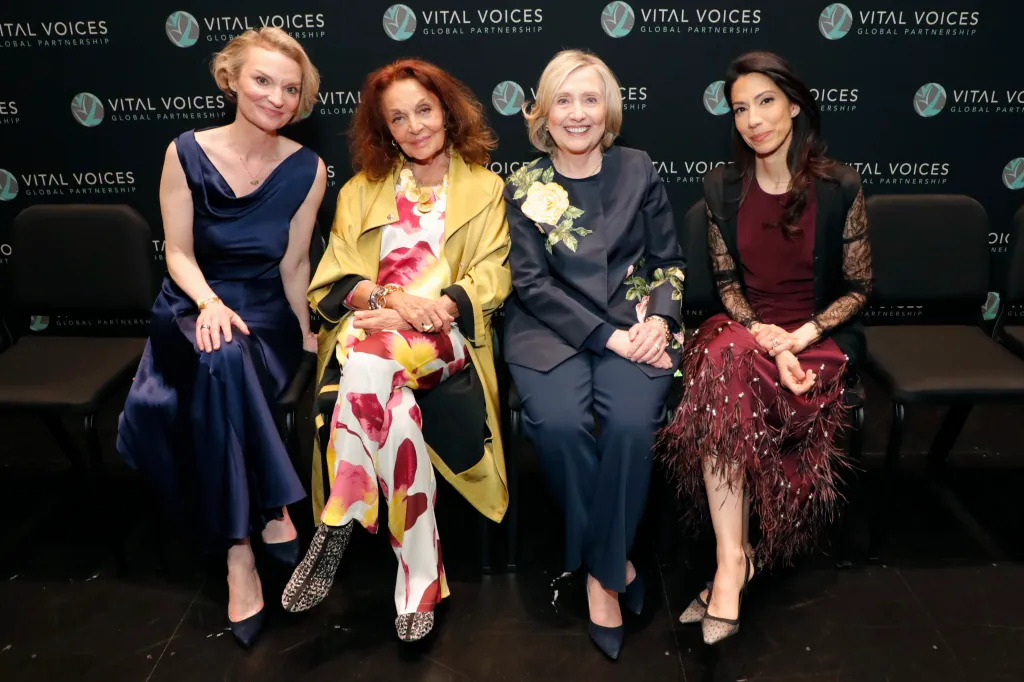 Alyse Nelson, Diane von Furstenberg, Hillary Clinton, and Huma Abedin seated at the Vital Voices Global Leadership Awards.