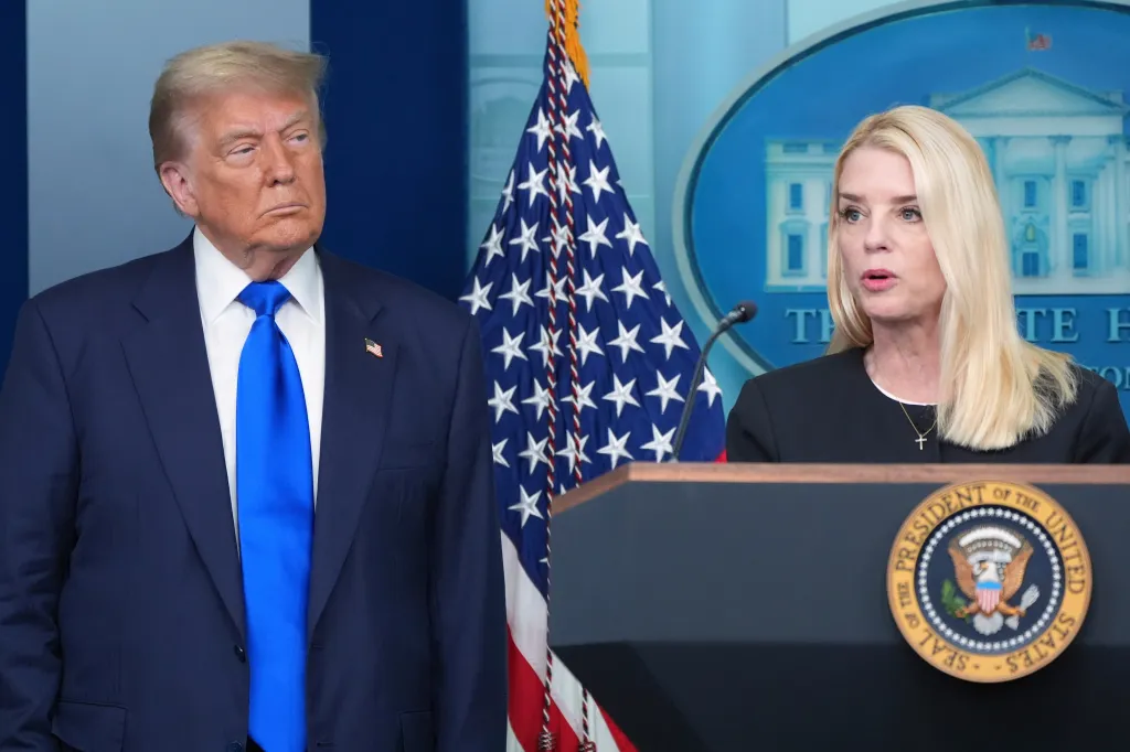 President Donald Trump looks on as Attorney General Pam Bondi speaks in the White House Press Briefing Room on June 27, 2025.