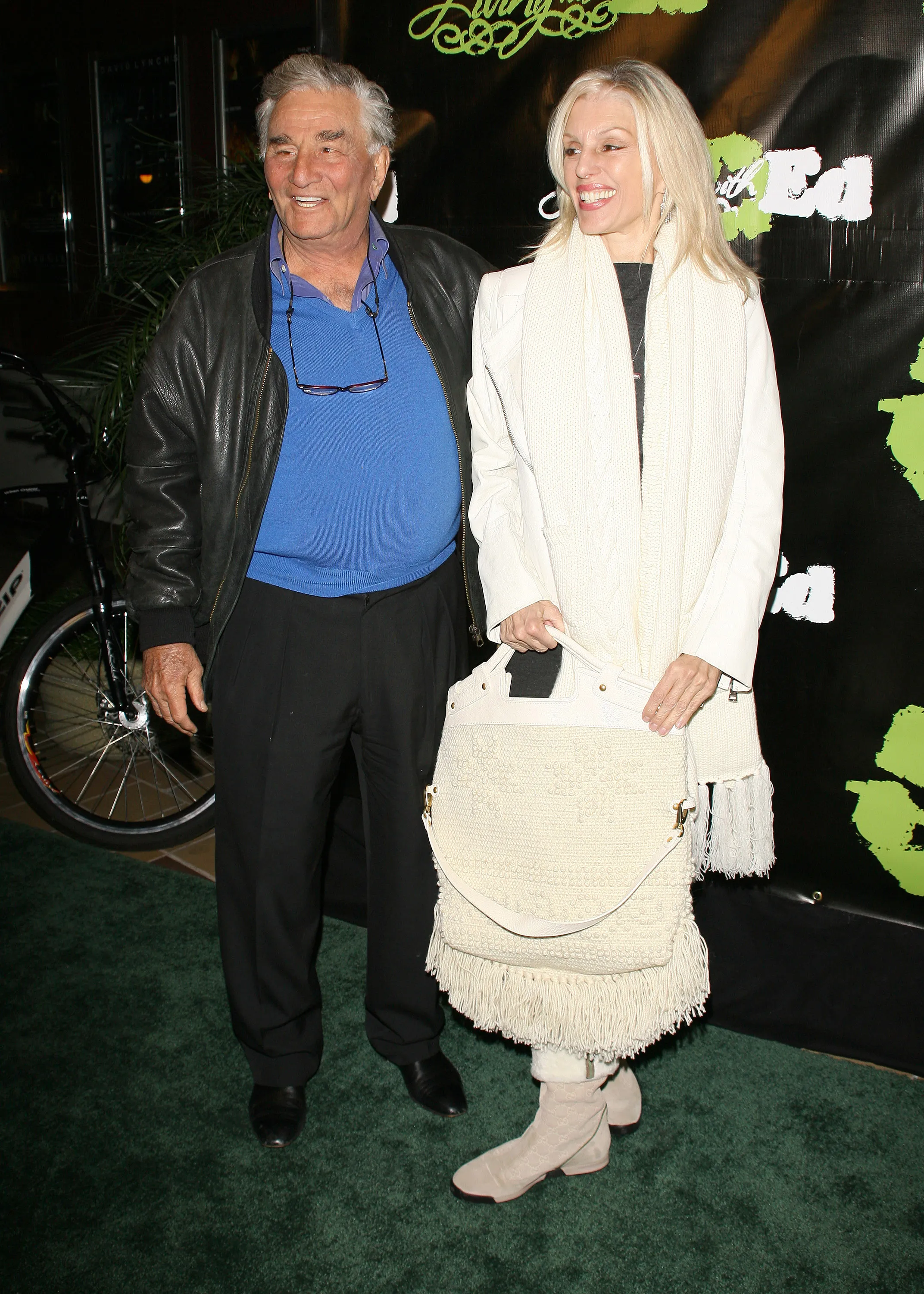 Peter Falk and his wife, Shera Danese, smiling at the 