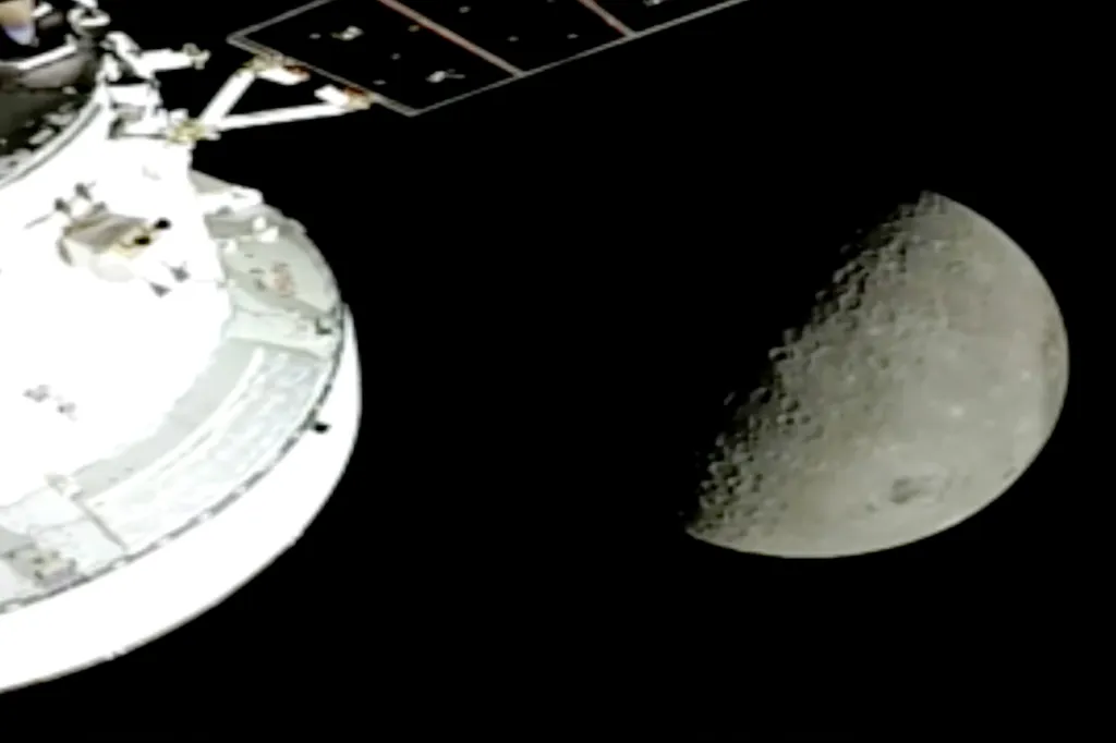 Orion spacecraft during its lunar flyby with the Moon in the background.