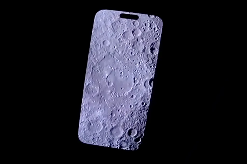 Smartphone screen displaying a close-up image of the moon's surface, covered in craters.