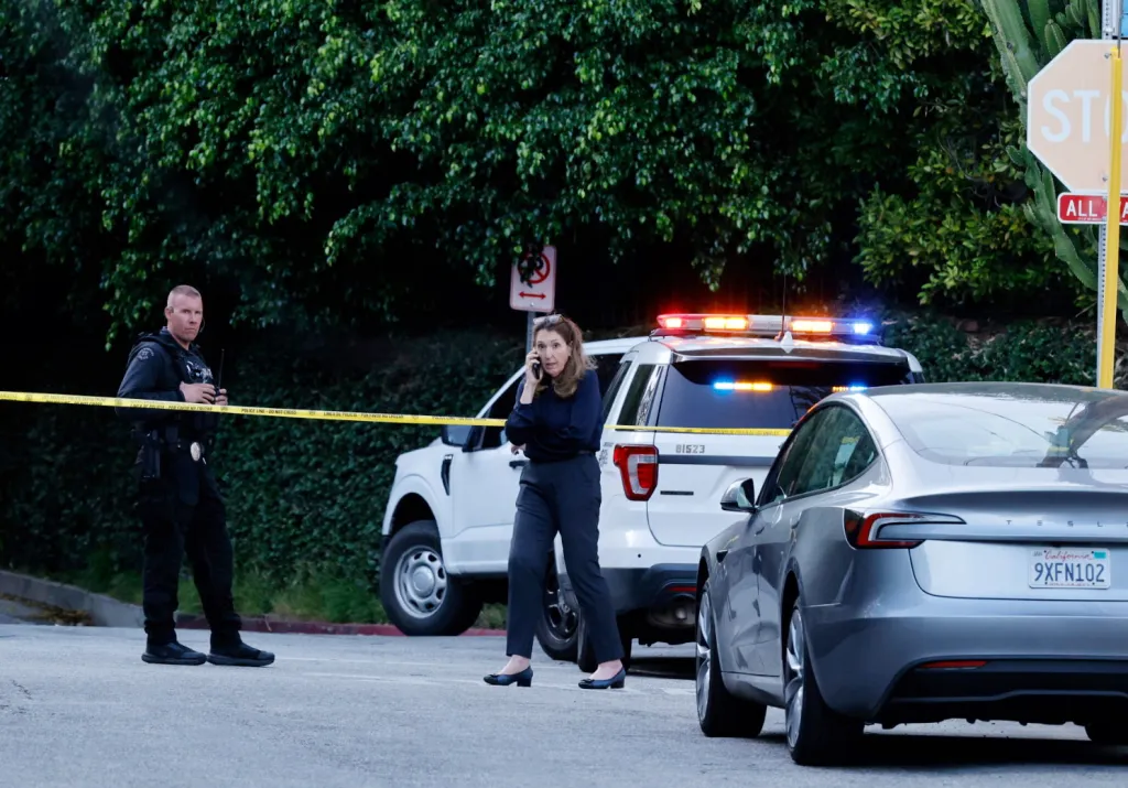 Attorney Blair Berk on the phone at the scene of D4vd's arrest.