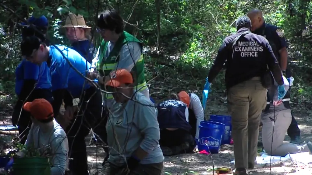 Officials work at a site in Memphis, Tennessee, where multiple human remains were recovered.