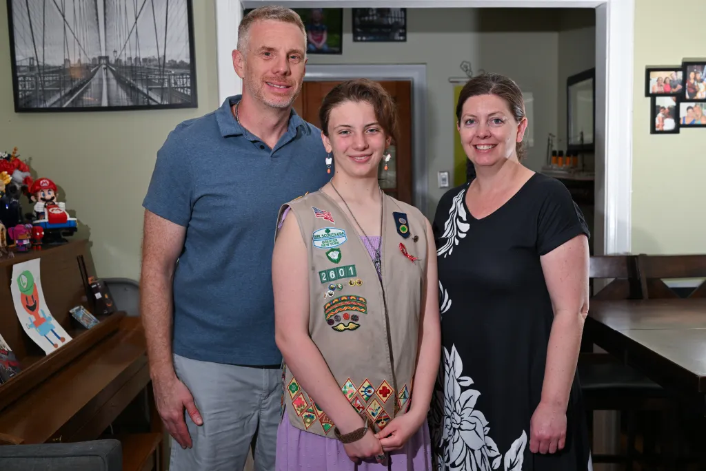 Ashleigh with her parents.