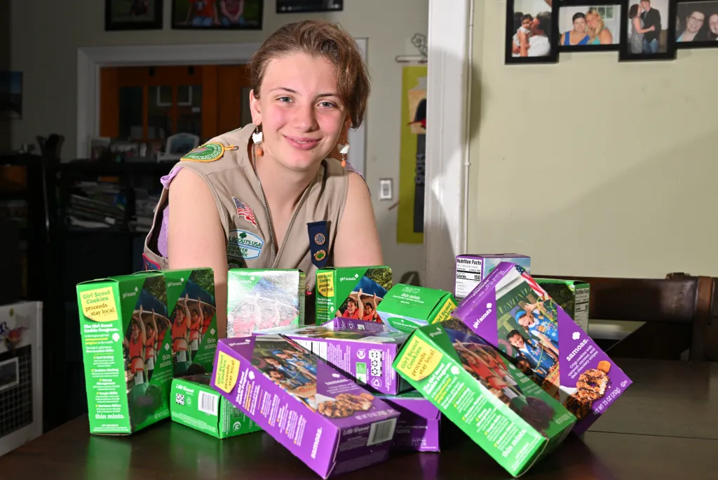 Ashleigh F with a pile of cookies.